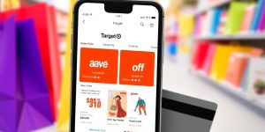Smartphone showing Target Sale App with shopping bags.